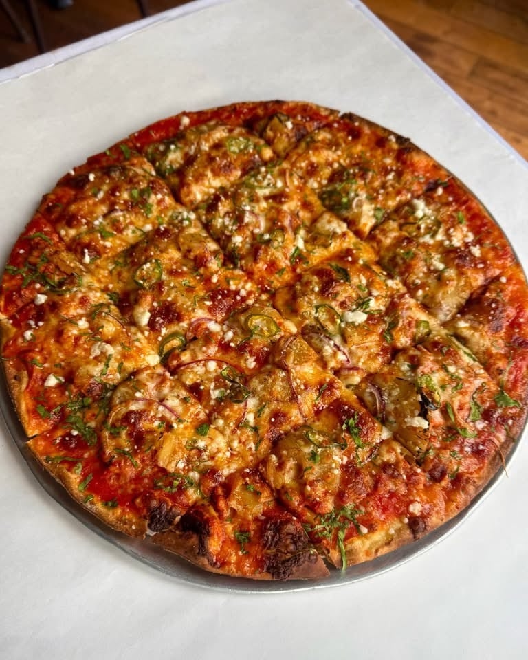Lucca's signature tavern style pizza